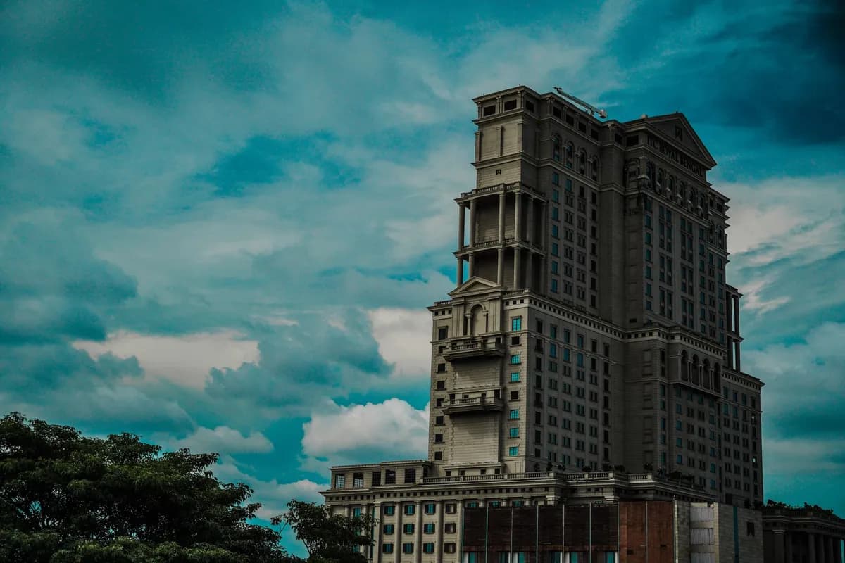 Modern hotel exterior representative image for an Indore stay listing
